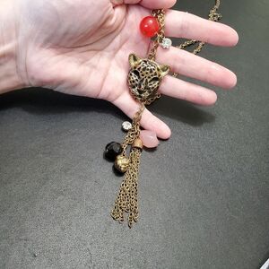 Gold tone cheetah pendant necklace 40-43"